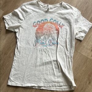 Graphic White T-Shirt Featuring Dolly Parton. Lightweight and Very comfortable